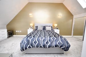 Bedroom One- click for photo gallery